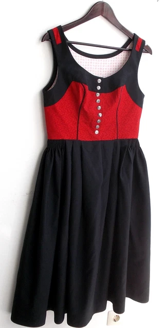 Dirndl tradizionale donna top senza maniche rosso, gonna nera circa taglia 40