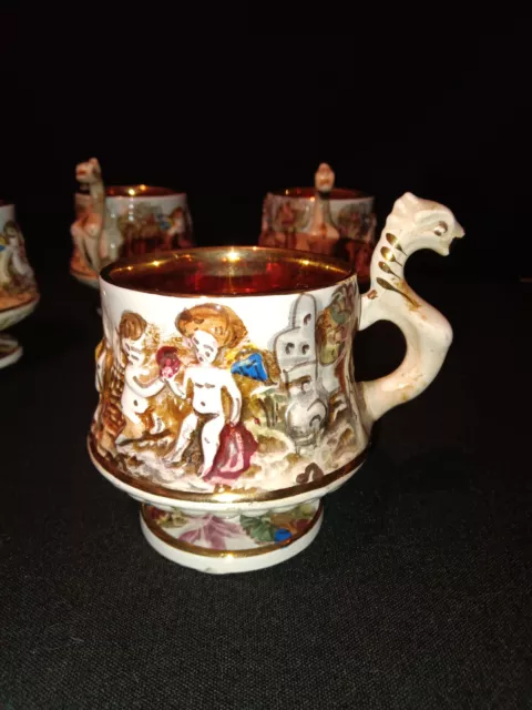 Set Of 4 Royal Capodimonte Cherubs tea cups