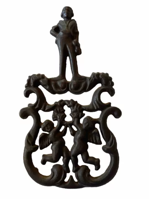 J.Z.H.Black Cast Iron Trivet Dated 1955 Sailor With Cupids Vintage