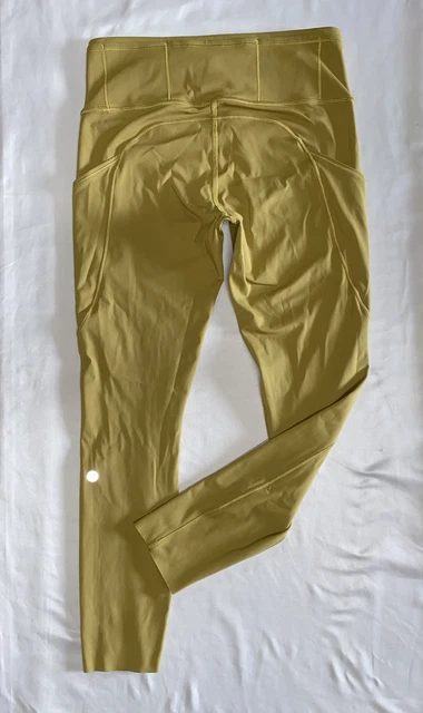 LULULEMON size 8 Speed Tight 25” High Rise Gym 7/8 Run Side Pockets Raw Hem READ