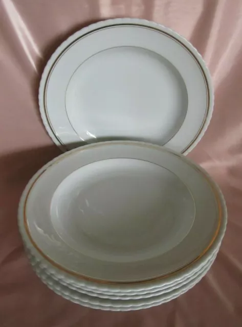 Série de 6  assiettes creuses en porcelaine de Limoges blanche filets or 25 cm