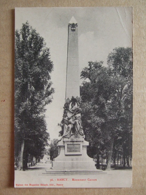 CPA NANCY (54) MONUMENT CARNOT. Ed HOUSES OF STORES REUNIS, NANCY.
