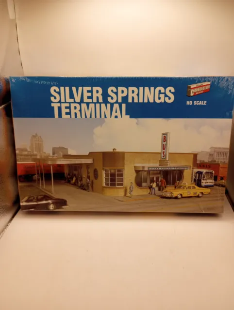 Set of 2: Vintage Die Cast Greyhound Bus and Walthers Silver Springs Terminal