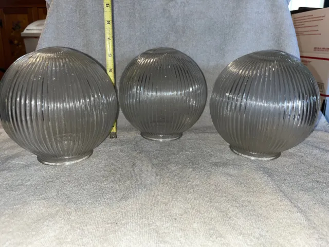 Set of 3 ribbed glass globes  Fitter measures 3" and Globe is 6.5" tall