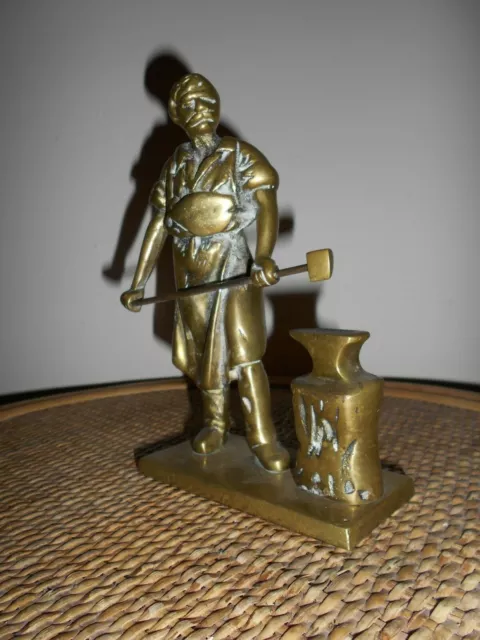 An Antique Heavy Cast Brass Figurine Of A Blacksmith. Brass Blacksmith  Doorstop 3