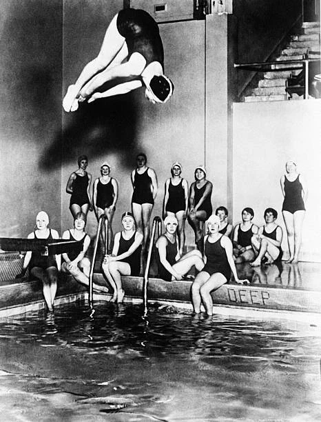 Woman taking a dip in the pool at the Women's Athletic Pavilion in - Old Photo 1
