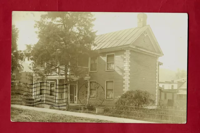 Logan, WV, 1910 postmark on  rppc of fine old house with 2 story porch, VF