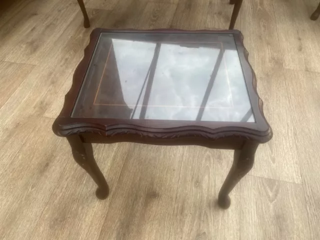 Small mahogany coffee table glass top