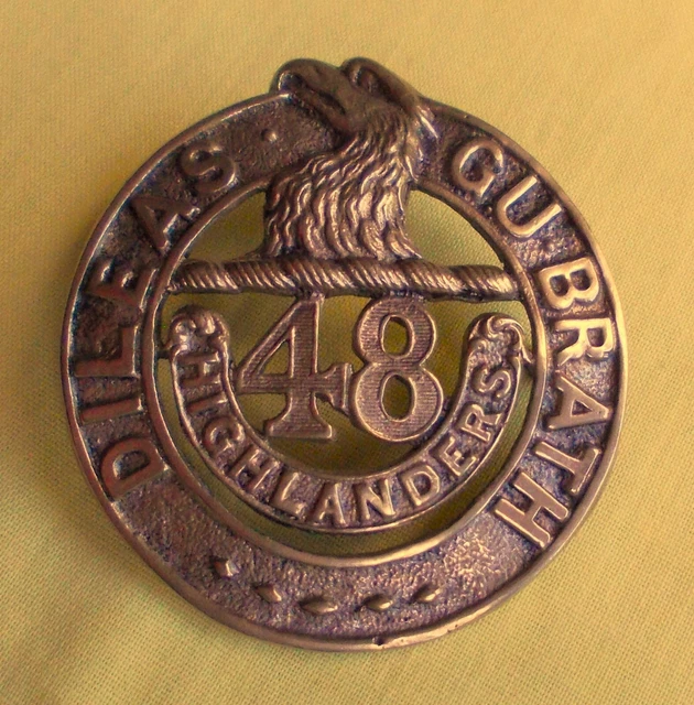 CAST WHITE METAL 48th. CANADIAN HIGHLANDERS CAP BADGE - B910
