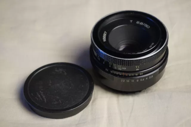 Carl Zeiss Jena R.d.a. Tessar 50 MM 2.8 ( Oeil d' aigle ) M42 bon état.