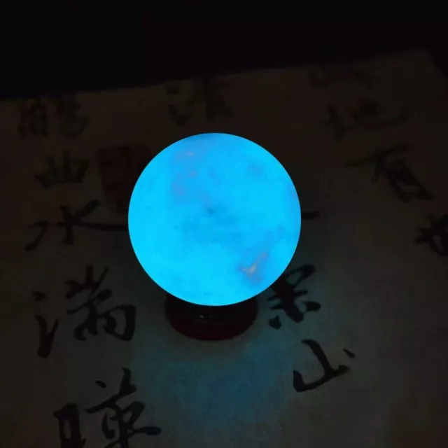 Blue Luminous Quartz Crystal Ball Luminous Dark Stone With Wooden Base.