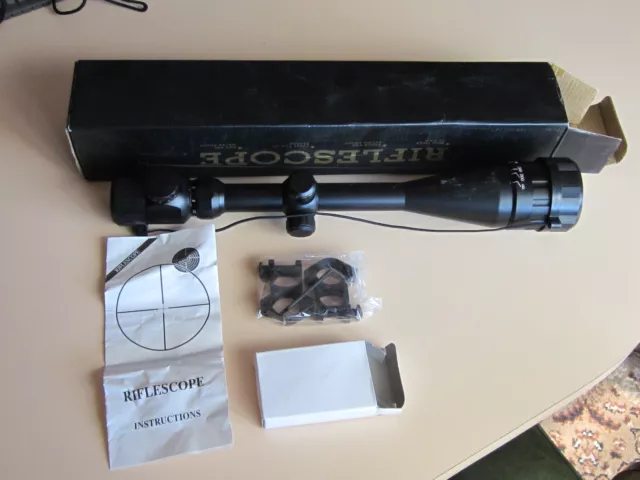 6-24x50 AOE rifle scope, adjustable parallax, bullet drop compensator, rings