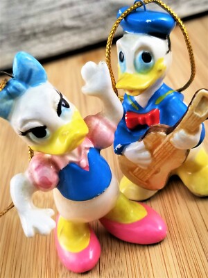 donald and daisy duck figurines