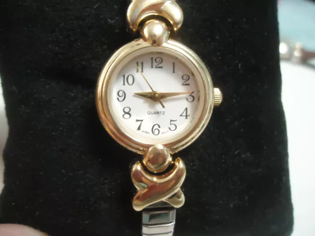 Vintage Avon Watch Two-Tone  Stretch Band, 7/8" Fac Arabic Numerals Battery Reqd