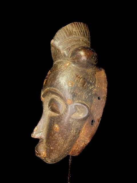 Maschera africana antica intagliata a mano in legno da parete con...