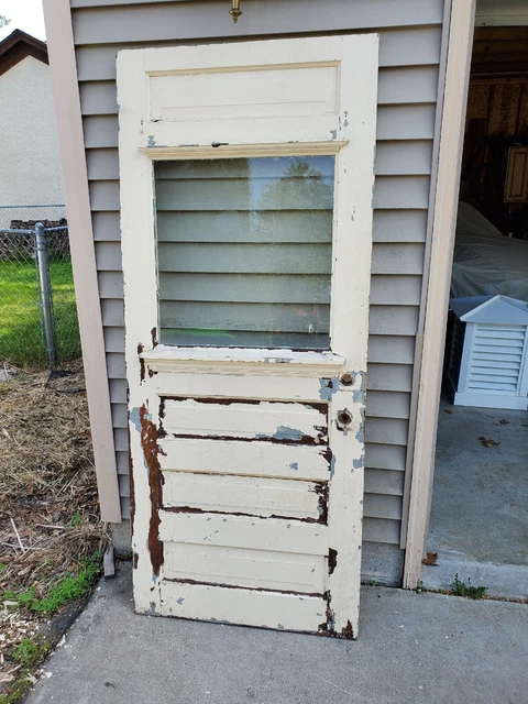 Antique Vintage 4 panel door molding on top and bottom of window as found