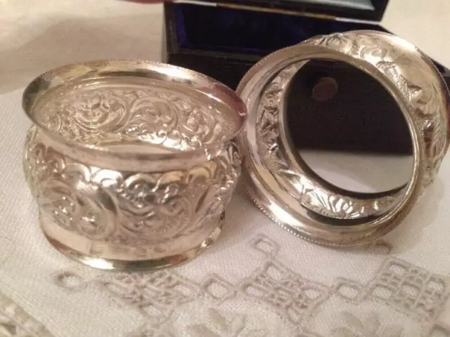 VICTORIAN NAPKIN RINGS. Sterling silver serviette holder set in presentation box