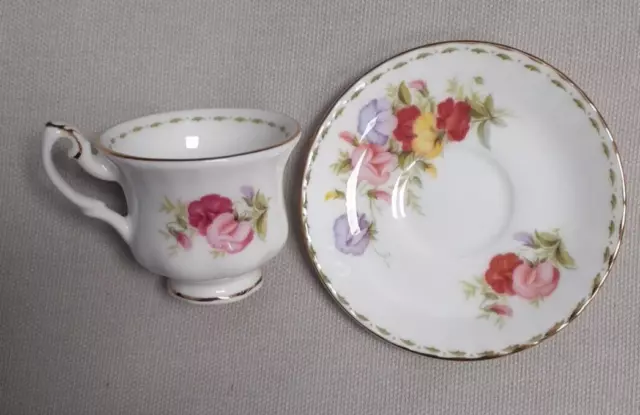 Royal Albert “April- Sweet Pea” Miniature Tea Cup And Saucer.