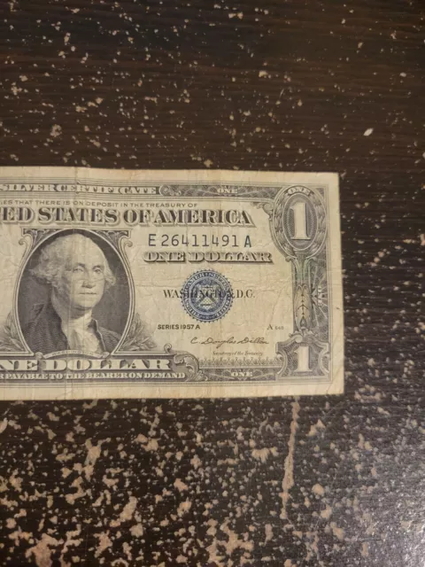 One Dollar Silver Certificate with Blue Seal Series 1957A E26411491A