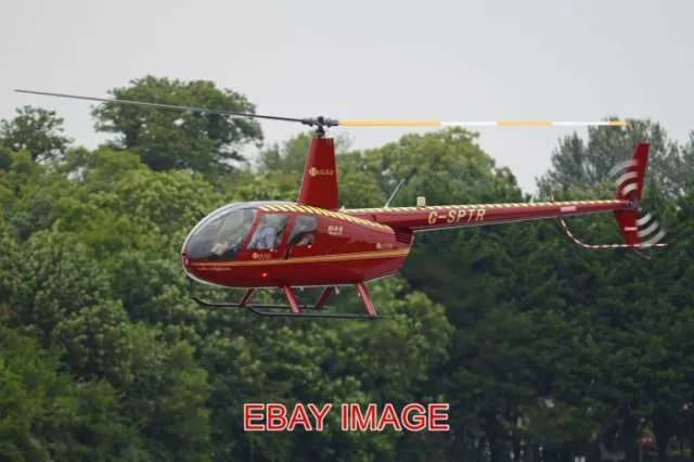 Photo  Helicopter Robinson R44 Raven Ii 'G-Sptr' C/N 12799. Built 2009. Seen Arr