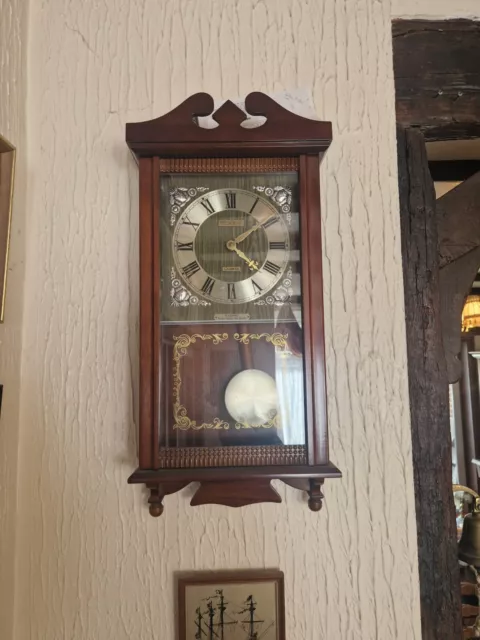 "President" Oak Veneer Cased Wall Hanging Clock, Battery Operated