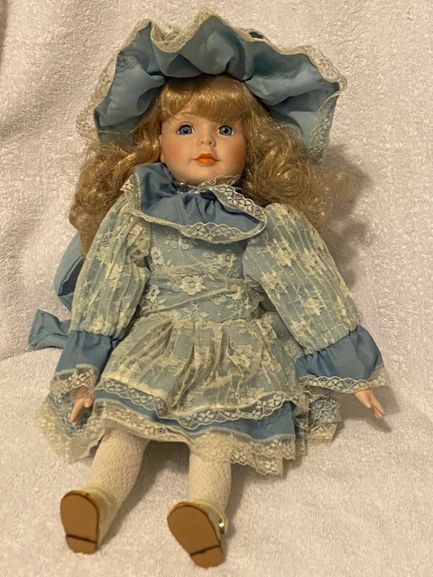 Dynasty Doll Collection Eileen Porcelain Doll Blue eyes dress blonde hair anna