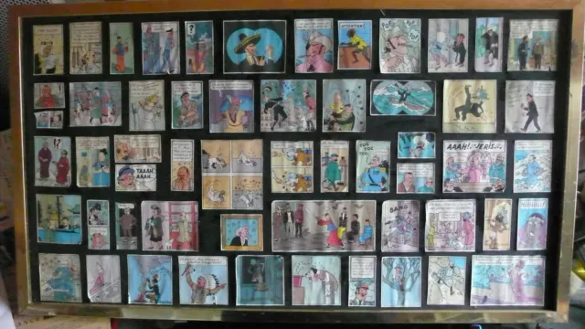 TINTIN: cadre présentant 56 vignettes des personnages des albums Tintin
