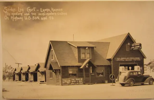 1936 ? SNIDER LOG COURT, LYONS, KS, Marathon Gasoline. 1936 PLYMOUTH. b&w RPPC