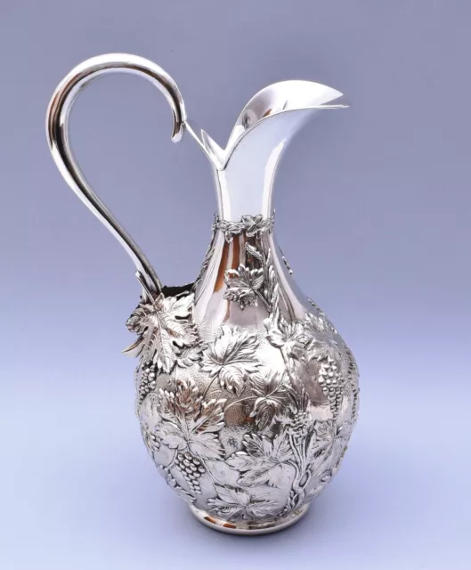 AMAZING SOLID SILVER REPOUSSE PITCHER. Height: 30 cm. Weight: 534 grams