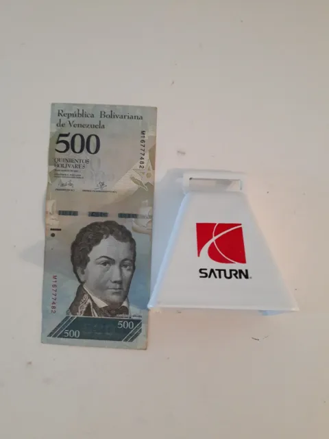 GM Saturn Car Advertising Cow Bell Promo white 500 foreign currency Venezuela T4