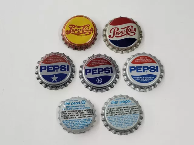 Vintage Lot Of Seven Multicolored Pepsi-Cola Bottle Caps. Good Condition