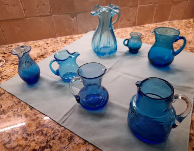 Unique Mixed Lot of 7  Blue Glass Pitchers includes 3 Blenko Crackled Style