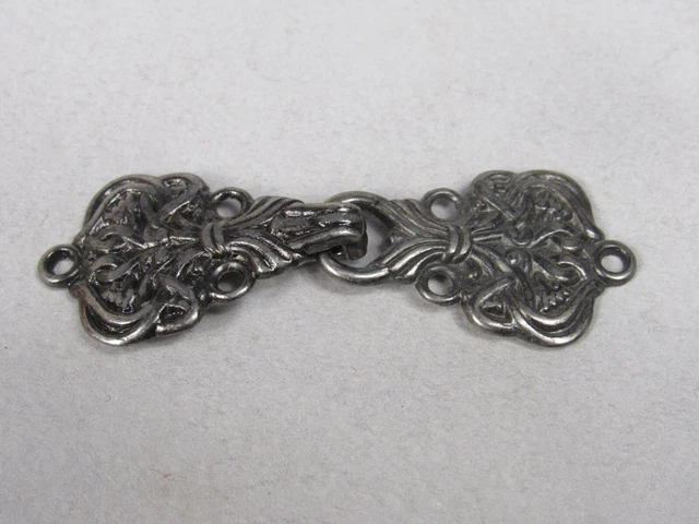 Sujetador de rana de metal plateado Knotwork