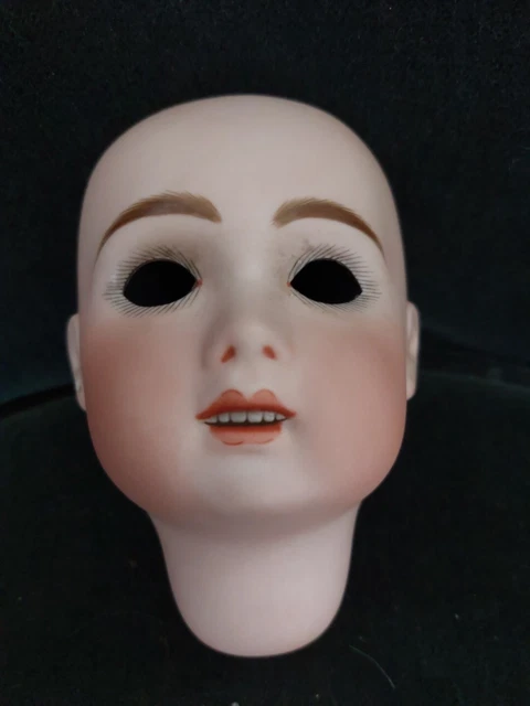 Tête de poupée en celluloïd vintage