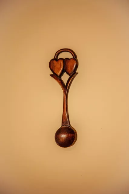 Welsh love spoon with two hearts entwined