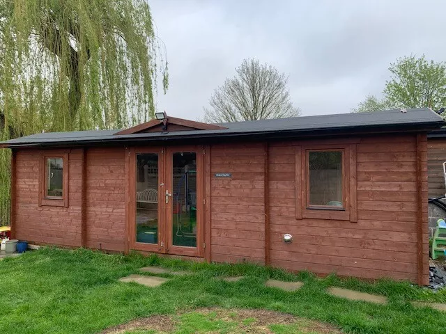 Garden log cabin - can be used as a man cave / host guests / play room / office