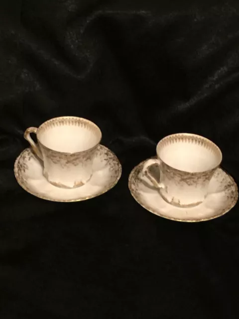 2 antique Theodore Haviland Limoges France Gold Flowers cups and saucer.