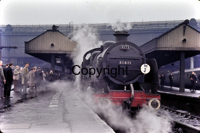 35MM COLOUR SLIDE ex SR N class 31411 at Waterloo 1966. Sold with ...