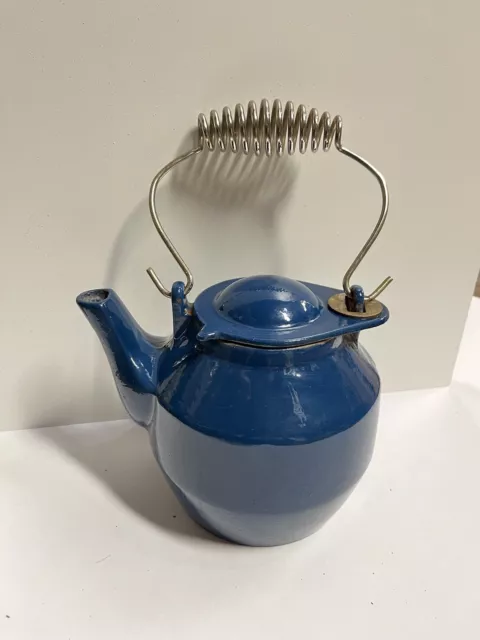 https://www.picclickimg.com/2pUAAOSwTqxkQI9K/Cast-Iron-Tea-Pot-Kettle-Swivel-Lid-Metal.webp