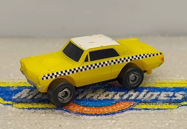 Micro Machine Taxi Cab 1965 Pontiac GTO in Yellow with Checkerboard