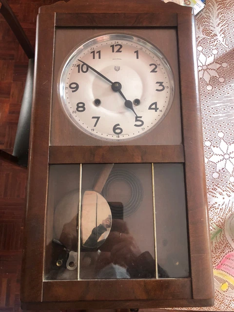orologio a pendolo da parete in legno