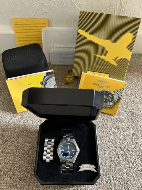 Breitling Aersopace Titanium & Gold Model F65362 Box & Papers Quartz Watch