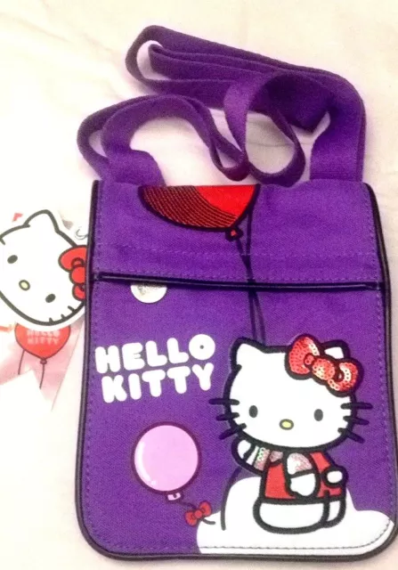 Hello Kitty - Sanrio - Bandolera Pequeña En Tejido Rosa Violeta 15x20- Cartorama