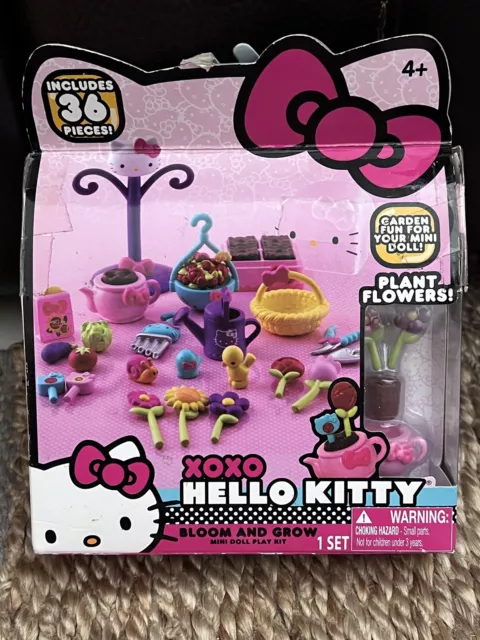 https://www.picclickimg.com/2s4AAOSwxqJi9S62/XOXO-Hello-Kitty-Bloom-And-Grow-Mini-Doll.webp