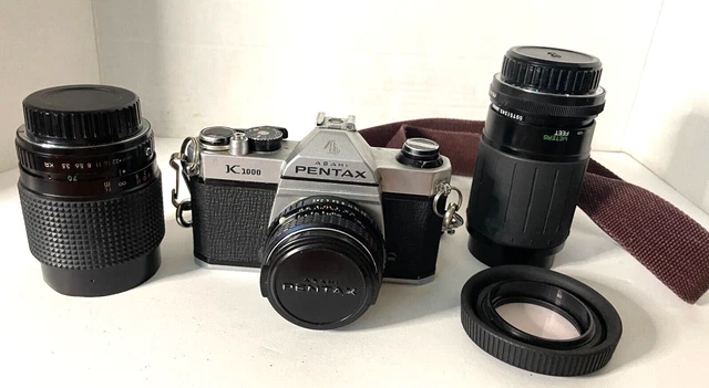 Pentax K 1000 SLR 35mm Film Camera w/ 3 lenses Clean Works Hong Kong Vintage