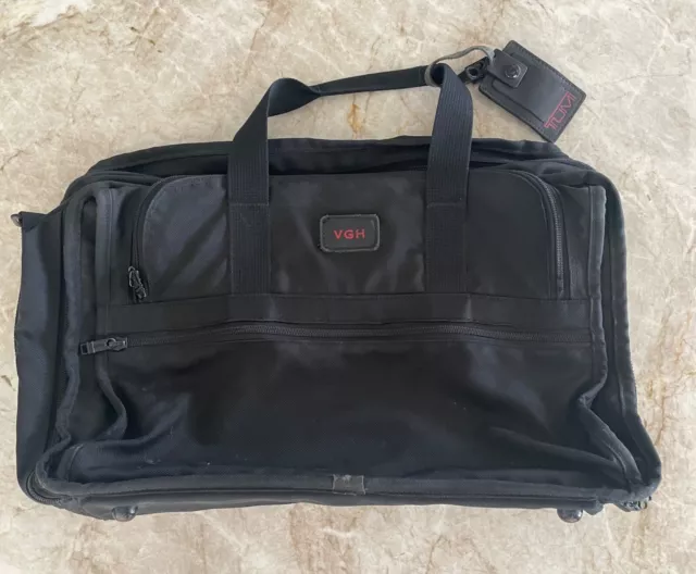 TUMI 22" Carry On Luggage Black Ballistic Nylon. Original Luggage Tag Included. 