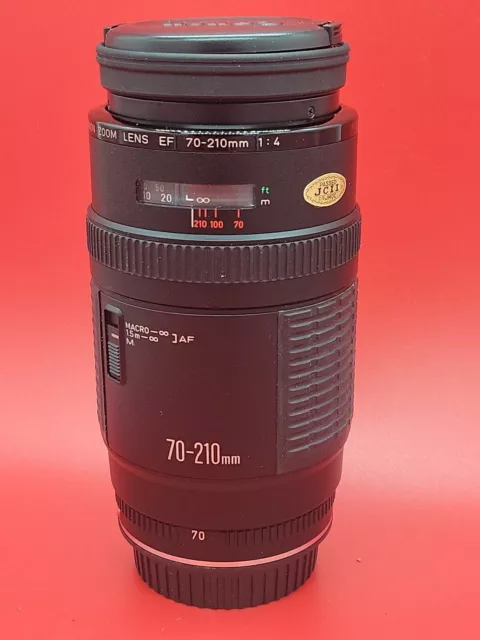Canon 70-210mm f/4 Macro Telephoto Zoom  Push-Pull Lens.   (C)