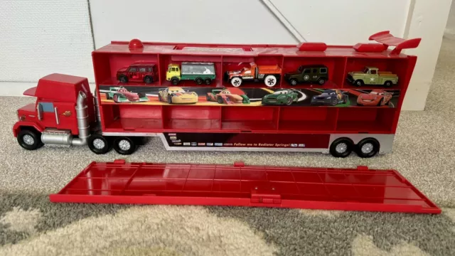 Disney store mack friction motor hauler hot sale