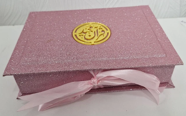 Quran with a cover (pink)