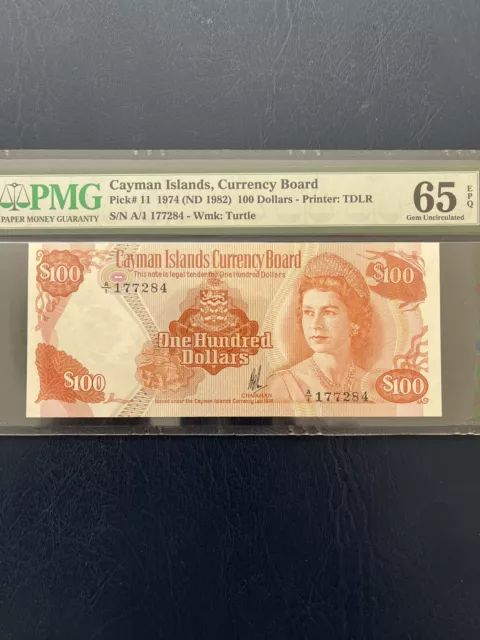 Cayman Islands 100 Dollars 1974 (ND 1982) Prefix A/1 Pick-11 GEM UNC PMG 65 EPQ